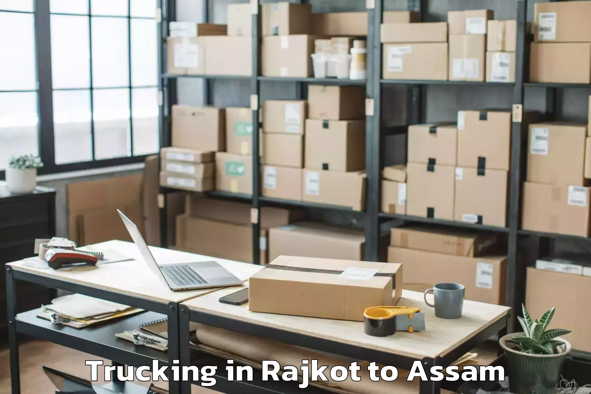 Reliable Rajkot to Fekamari Trucking